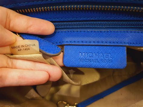 how to tell if the michael kors bag is real|Michael Kors serial number checker.